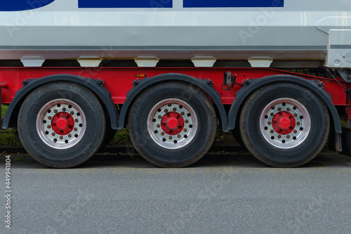 Front view on truck wheels and tires on truck chassis. Truck wheel rim. © Viktor