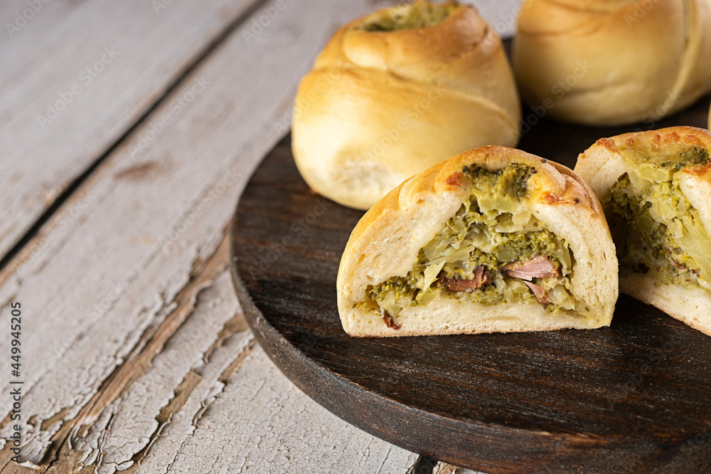 Baked snacks ​​ - bread stuffed with broccoli, cheese and bacon
