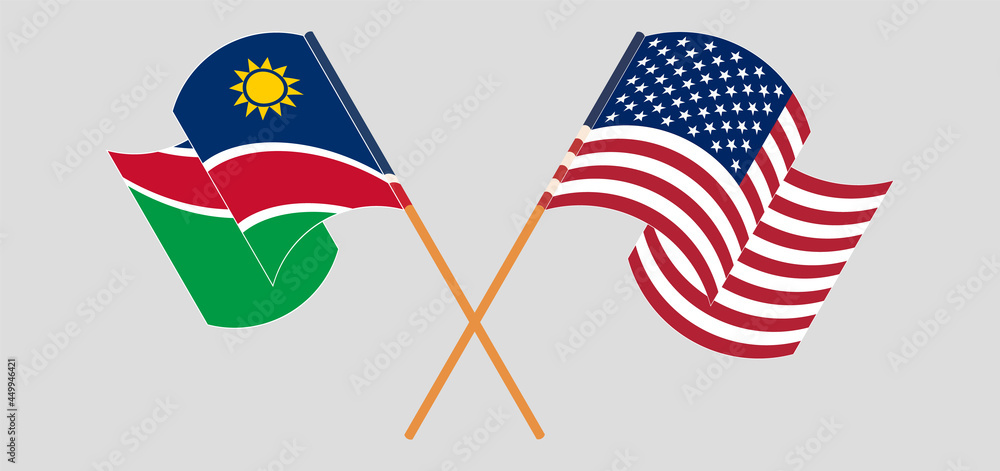 Crossed and waving flags of Namibia and the USA
