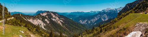 High resolution stitched panorama of a beautiful alpine summer view with the Kreuzeckbahn at the famous Alpspitze summit near Garmisch Partenkirchen, Bavaria, Germany