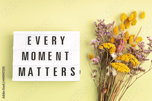 Lightbox with text every moment matters. Mental health, positive thinking, emotional wellness concept photo