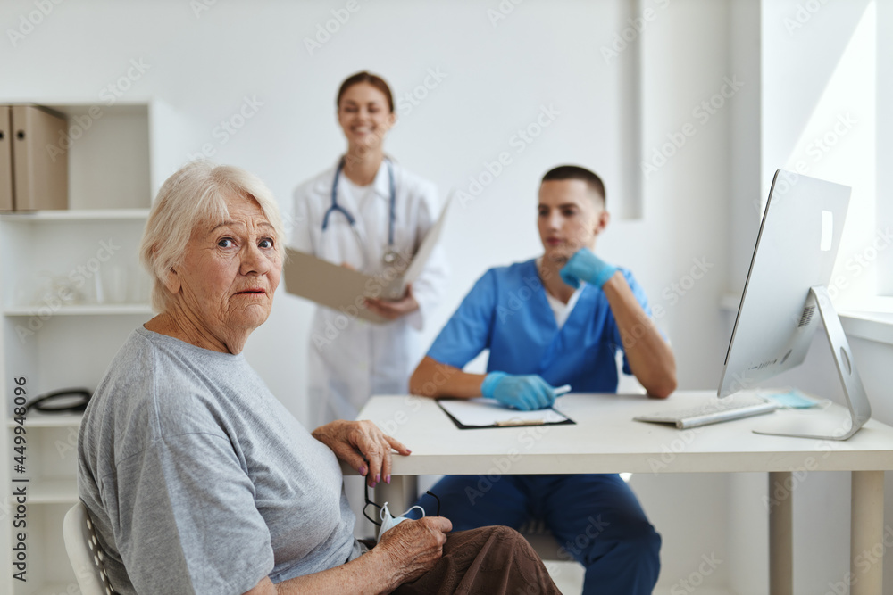 elderly woman patient in hospital nurse and doctor elderly woman patient in hospital nurse and doctor