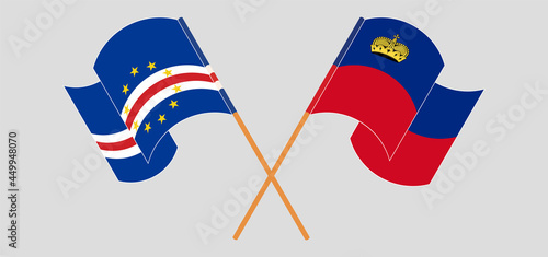 Crossed and waving flags of Cape Verde and Liechtenstein