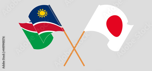 Crossed and waving flags of Namibia and Japan