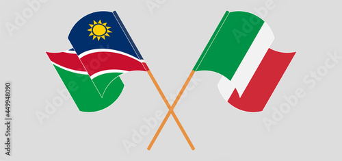 Crossed and waving flags of Namibia and Italy