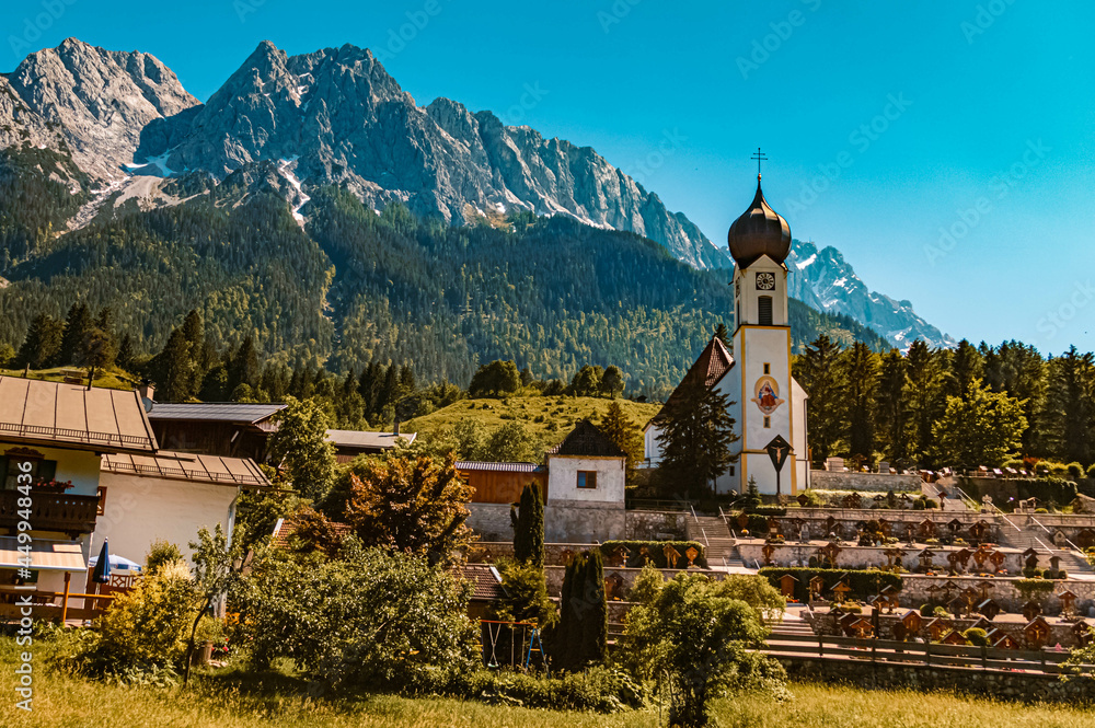 Beautiful church with the famous Zugspitze summit at Grainau near Garmisch Partenkirchen, Bavaria, Germany