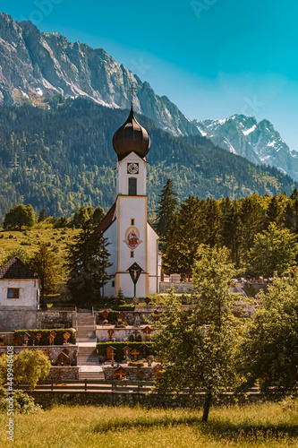 Beautiful church with the famous Zugspitze summit at Grainau near Garmisch Partenkirchen, Bavaria, Germany