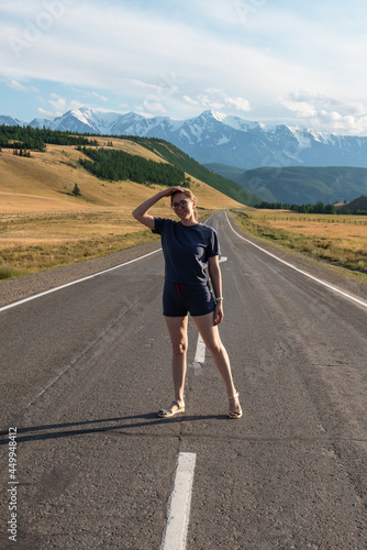 Woman om the Chuysky trakt road in the Altai mountains.
