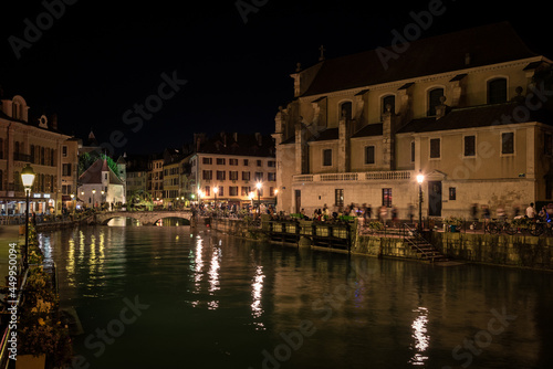 Old town of Annecy city illuminated at night and the reflection of the lights in the water of the canal, France © JMDuran Photography