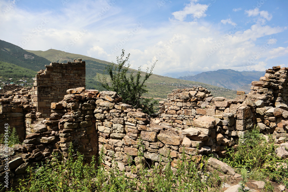 ruins of abandoned house in old village in the mountain
