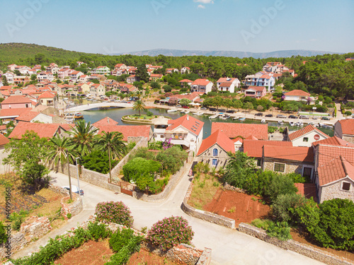 View of the bay and old city with fortress and church in the town of Vrboska on Hvar island, Croatia