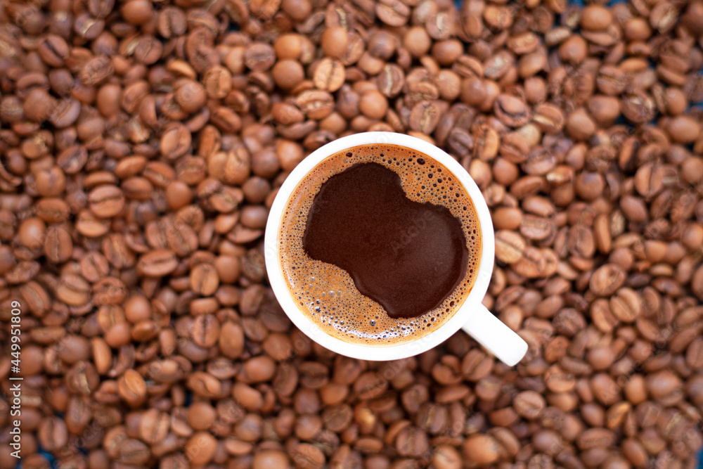 top view roasted coffee beans Turkish or Greek coffee. Traditional delicious refreshing Greek or Turkish coffee from greek or Turkish cuisine culture. top view roasted coffee beans Turkish or Greek coffee. Traditional delicious refreshing Greek or Turkish coffee from greek or Turkish cuisine culture.