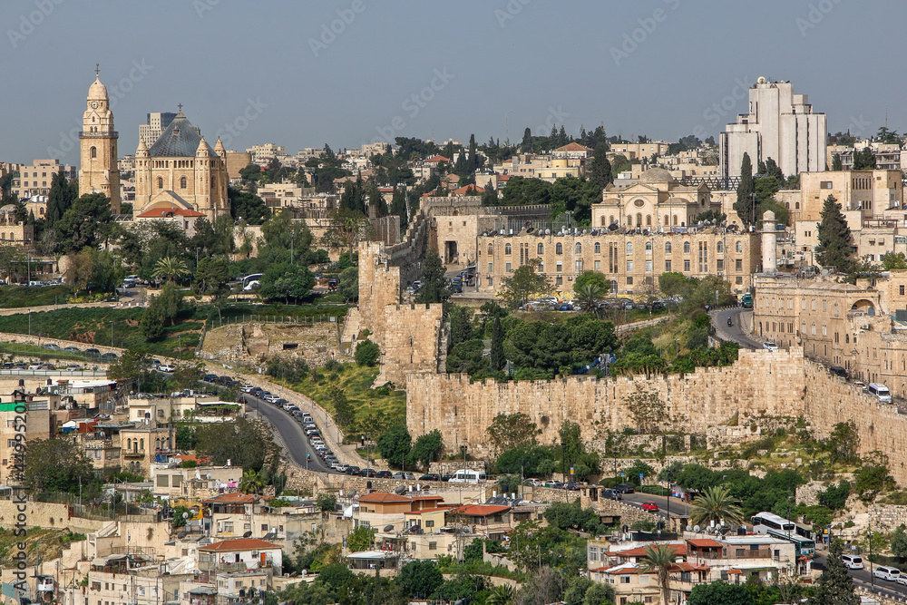 Cityscape of Old City, Jerusalem with city walls and Dormition Abbey in the background, Israel.