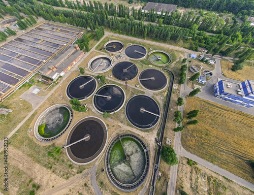Sewage water recycle. Sedimentation tanks in a sewage treatment plant, Aerial view