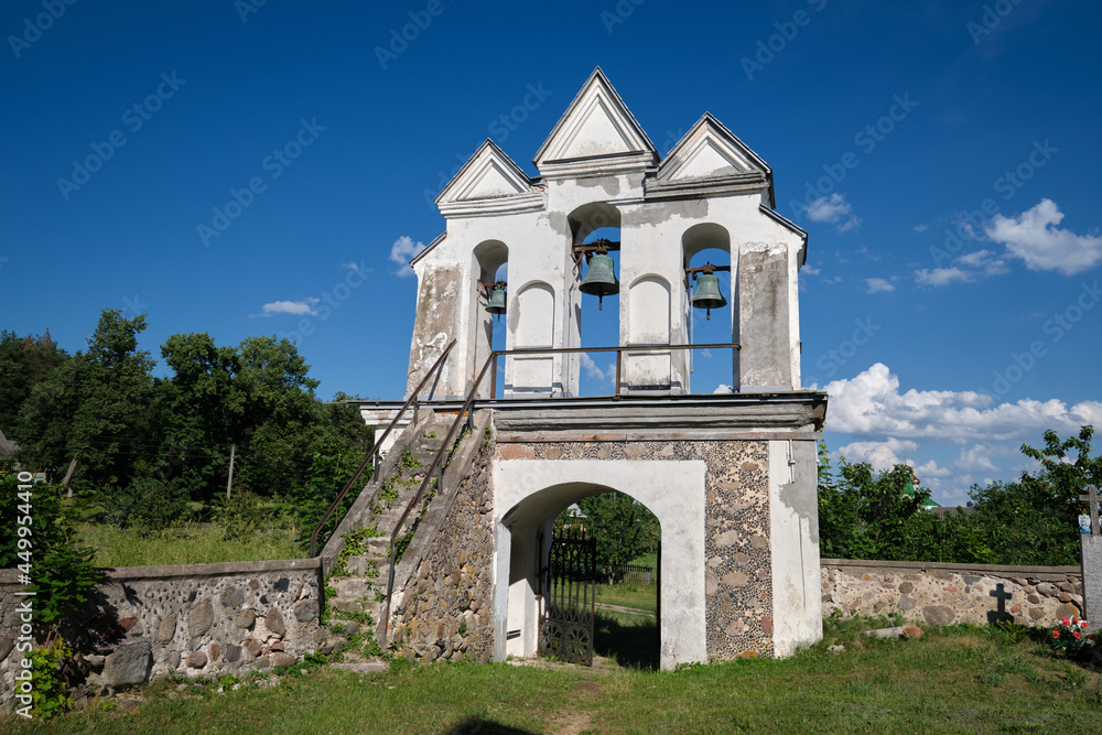 Old bell tower of ancient catholic church of the Annunciation of the Blessed Virgin Mary, Vishnevo, Minsk region, Belarus. Old bell tower of ancient catholic church of the Annunciation of the Blessed Virgin Mary, Vishnevo, Minsk region, Belarus.