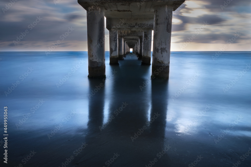 long exposure of the underlying part of the pier on the beach of marina di largo abruzzo at dawn long exposure of the underlying part of the pier on the beach of marina di largo abruzzo at dawn