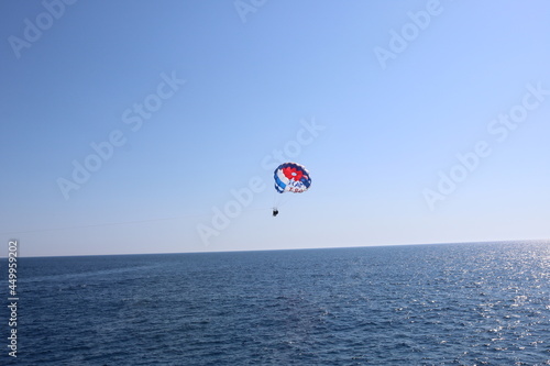 Parasailing in a blue sky, Alanya Turkey.