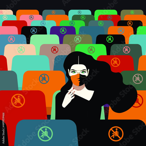 For Global Health - Coronavirus - COVID-19 - Pandemic - woman alone at the cinema with locked seats