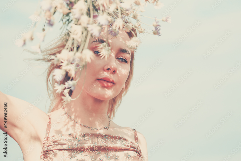 Beautiful fashion model girl with floral wreath. Spring summer background. Harmony natural concept concept