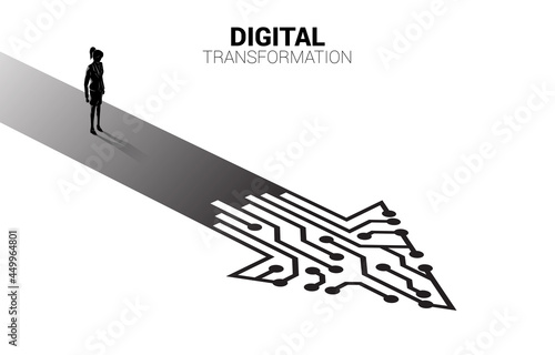 Silhouette of businesswoman standing on the way with dot connect line circuit. concept of digital transformation of business.