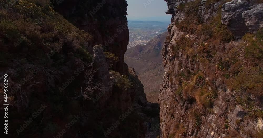 Aerial Moving Between Rocky Green Cliffs, Table Mountain, Cape Town, South Africa Aerial Moving Between Rocky Green Cliffs, Table Mountain, Cape Town, South Africa