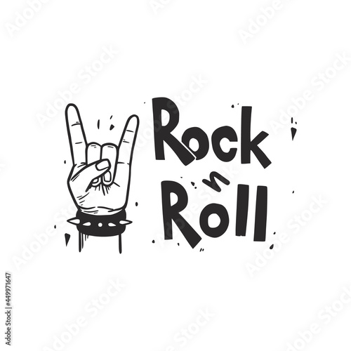 Rock and roll hand. Hand drawn doodle sketch style. Drawing black line music arm for rock, punk, metall sign. Isolated vector illustration.