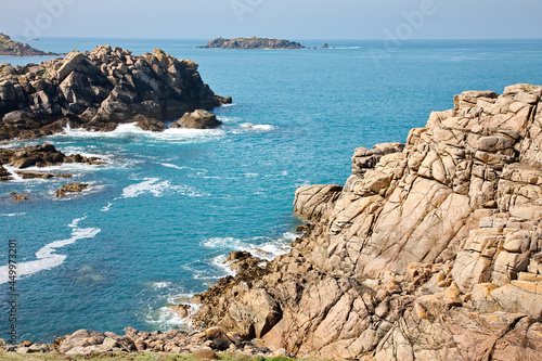 Landscape of rocks surrounded by the sea in Bryher, the Isles of Scilly, the UK photo