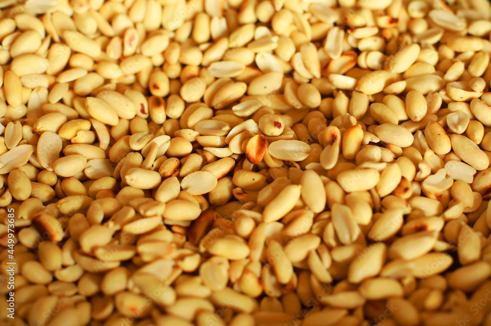 Close-up of fired salt peanuts that peeled and ready to eat Close-up of fired salt peanuts that peeled and ready to eat