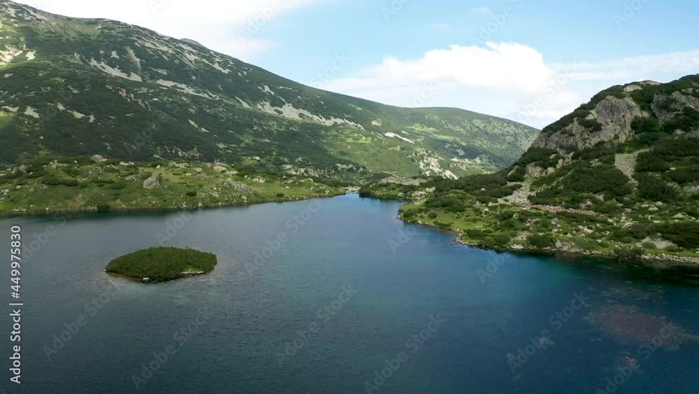 Flight over the Popovo Lake, a glacial lake situated in the northern section of the Pirin mountain range in Bulgaria. Flight over the Popovo Lake, a glacial lake situated in the northern section of the Pirin mountain range in Bulgaria.