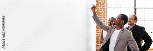 фотографія Businessman writing on a whiteboard