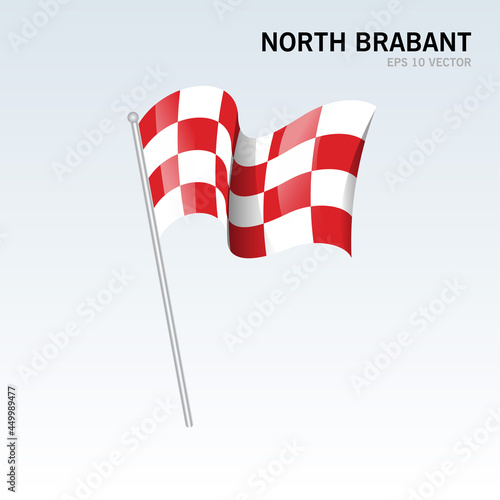 Waving flag of North Brabant provinces of Netherlands isolated on gray background