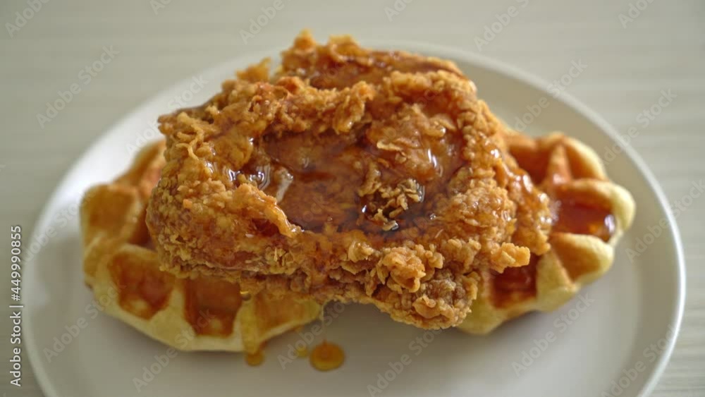 homemade fried chicken waffle with honey or maple syrup homemade fried chicken waffle with honey or maple syrup