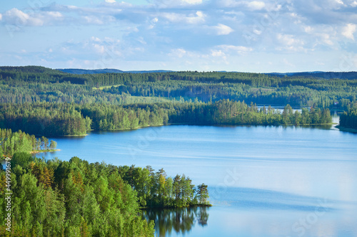 Fototapeta Naklejka Na Ścianę i Meble -  Summer view from the Neitvuori mountain in Finland to the lake and forest.