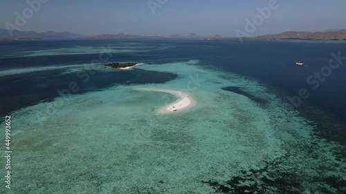 White Sand Bar At The Water Of Indonesian Sea At Labuan Bajo, West Manggarai Regency. aerial, orbit photo