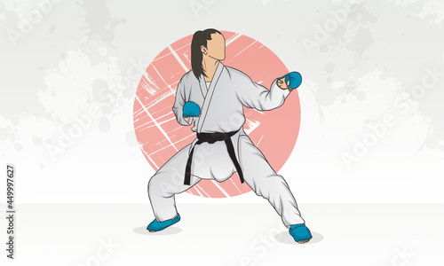 A woman in a kimono with a black belt and protective equipment is engaged in karate martial arts training.