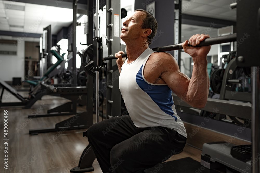 Portrait of a senior muscular man in a gym Portrait of a senior muscular man in a gym