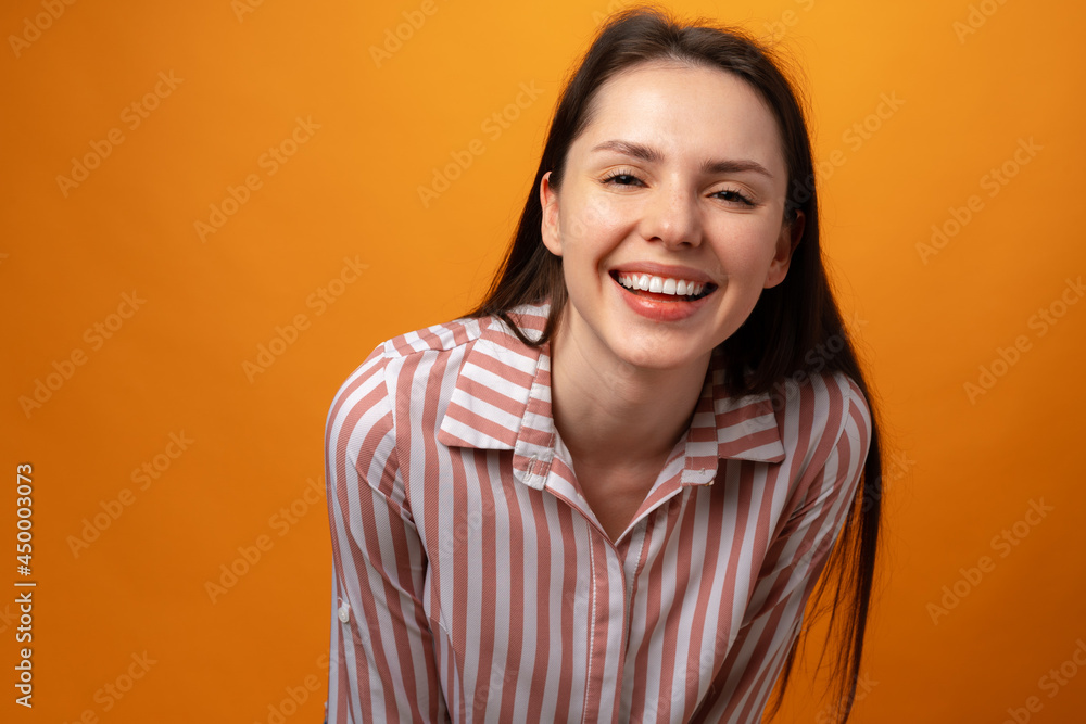 Portrait of young smiling brunette woman in studio Portrait of young smiling brunette woman in studio