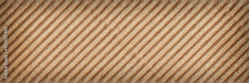 Patterned texture of corrugated cardboard. Abstract background. Banner  close-up.