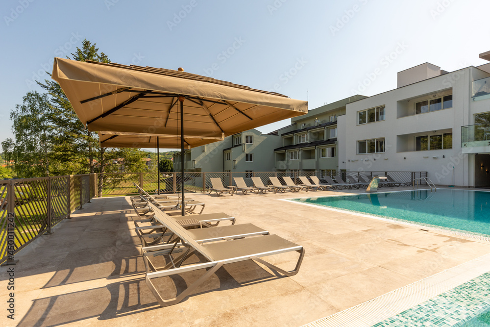 Fototapeta premium Outdoor swimming pool in a modern hotel