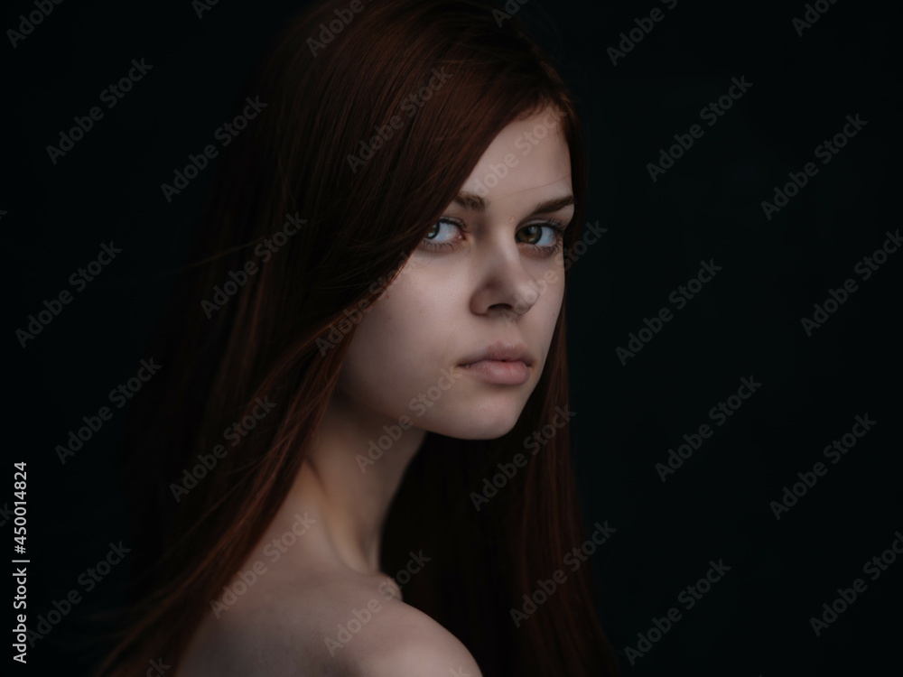 woman with bare shoulders glamor clear skin dark background woman with bare shoulders glamor clear skin dark background