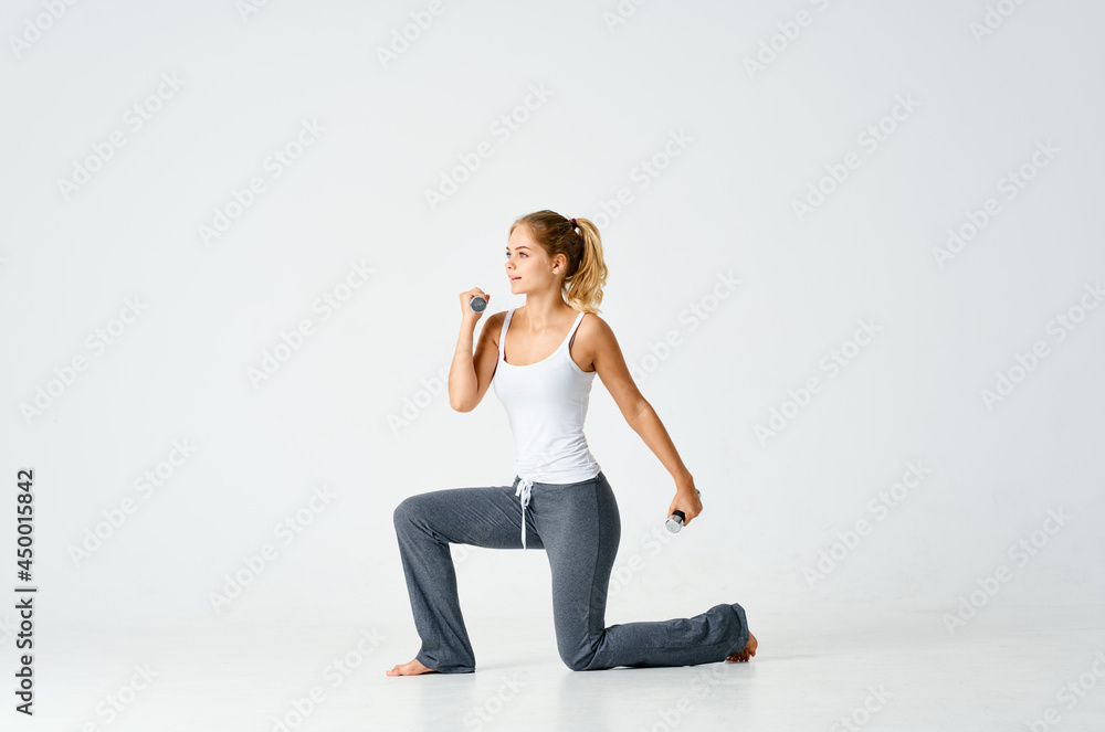 woman with dumbbells in hands trains motivation exercise fitness woman with dumbbells in hands trains motivation exercise fitness