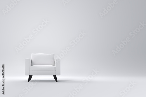 Monochrome armchair with pillows on studio white background.