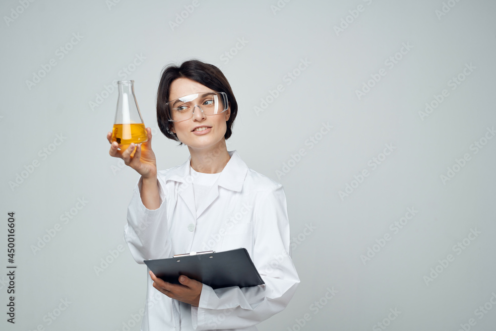 Cheerful woman laboratory assistant science research chemical solution Cheerful woman laboratory assistant science research chemical solution