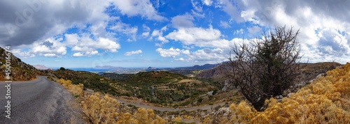 Panoramic view of the valley of olive fields with beautiful clouds, Crete, Greece