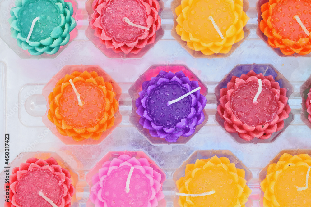 Many colored candles look like flowers. Many colored candles look like flowers.