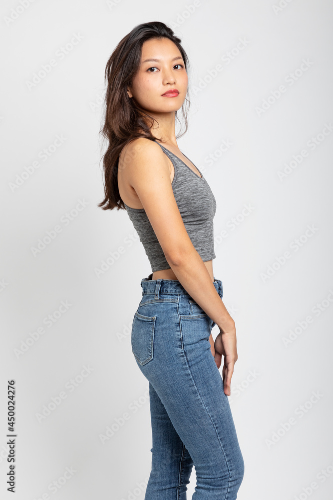 Portrait beautiful Asian girl with smile and brown hair. Sportswear and lipstick Portrait beautiful Asian girl with smile and brown hair. Sportswear and lipstick