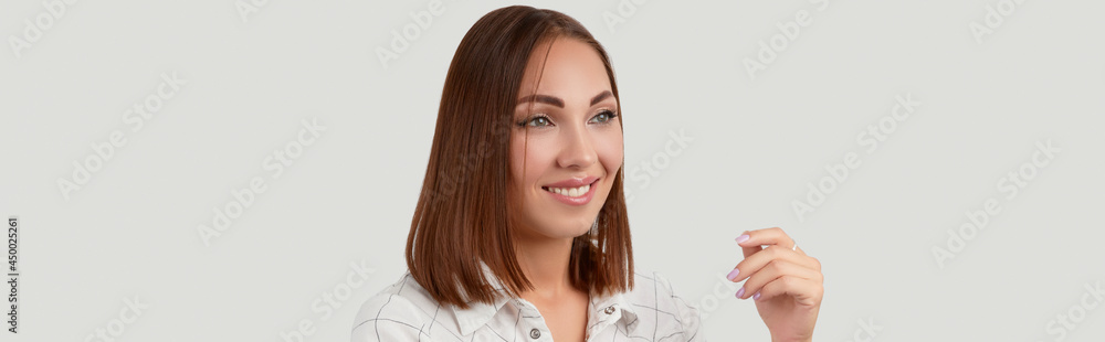 Beautiful woman in casual clothes posing over white background Beautiful woman in casual clothes posing over white background
