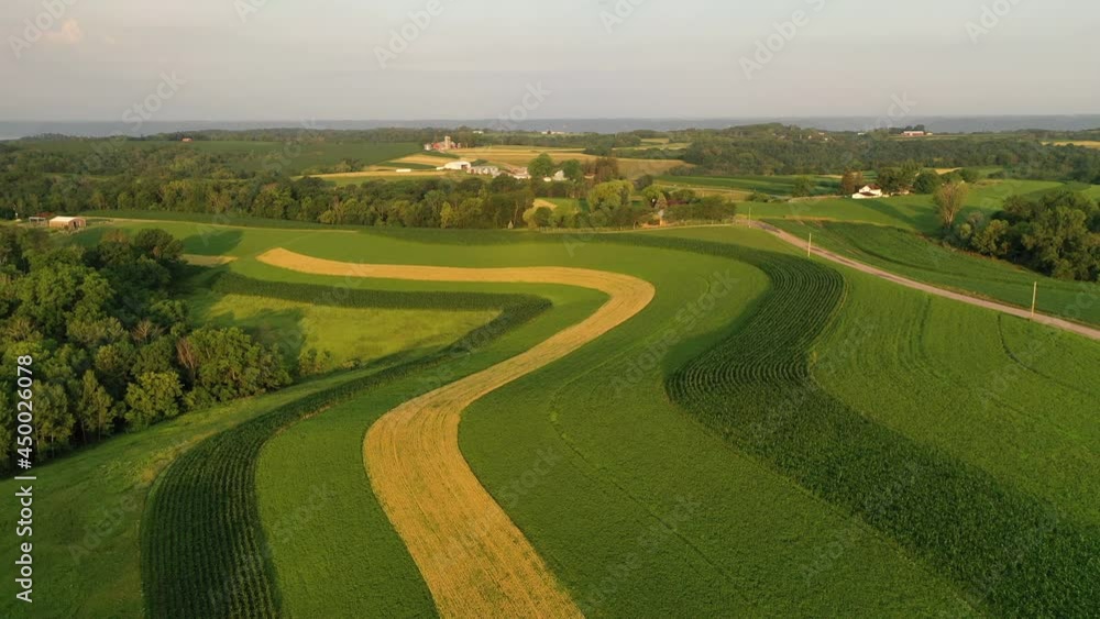 A drone aerial establishing shot of farmlands in rural Midwest America A drone aerial establishing shot of farmlands in rural Midwest America