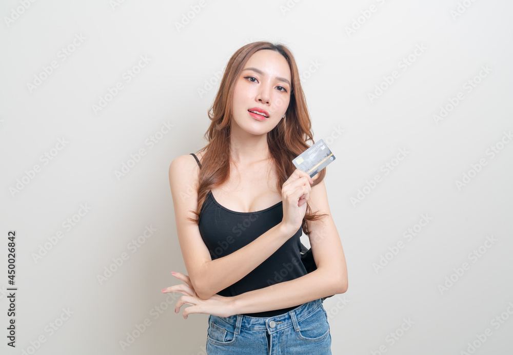 portrait beautiful Asian woman holding credit card portrait beautiful Asian woman holding credit card