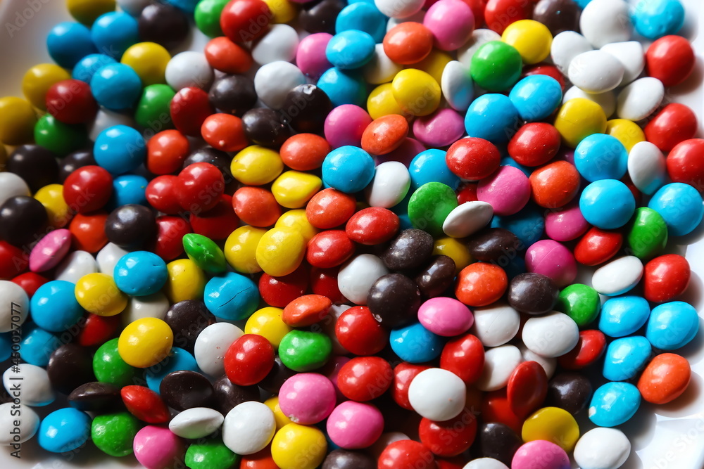 background with colored candies, sweets, festive mood background with colored candies, sweets, festive mood